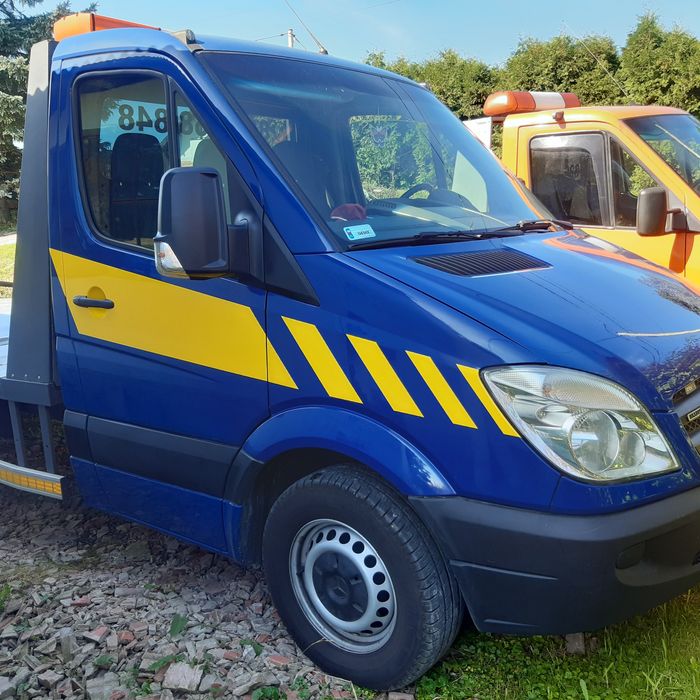 pomoc drogowa laweta transport pojazdow holowanie wieliczka krakow A4