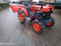 trator kubota com frese