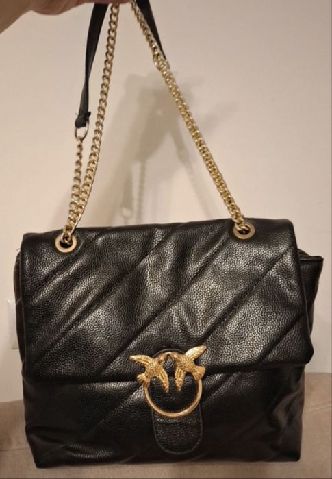 Czarna torebka z klamra jakółek