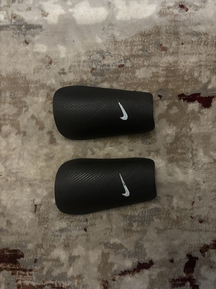 Caneleiras pretas da nike