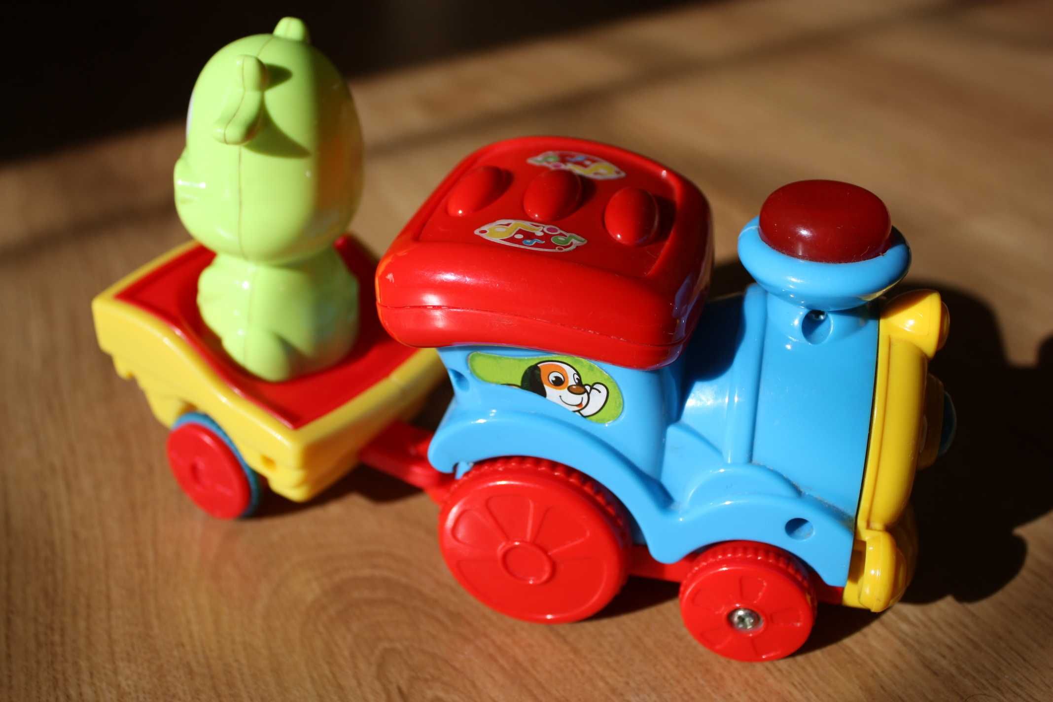 Grające zabawki dla maluszka - zestaw lokomotywa i paninko Smiki
