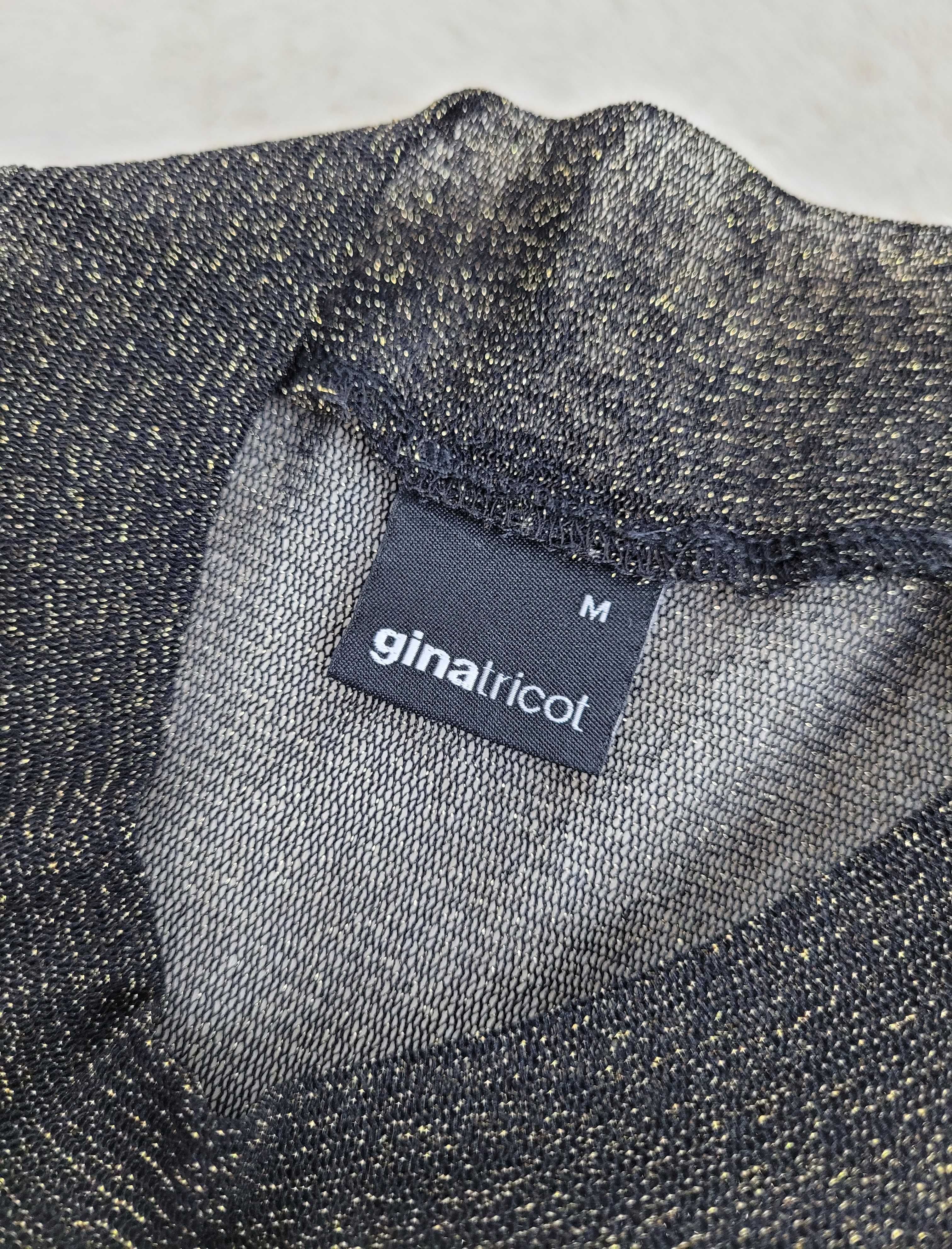Prześwitujący metaliczny top damski czarno złoty Gina Tricot M 38