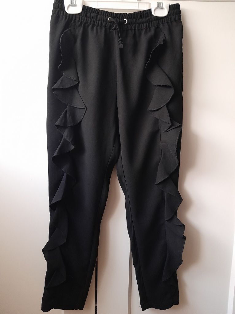 Eleganckie spodnie KappAhl 140 czarne.