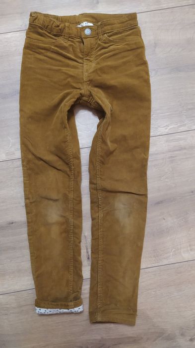 Sztruksy ocieplane H&M, r. 128, musztardowy