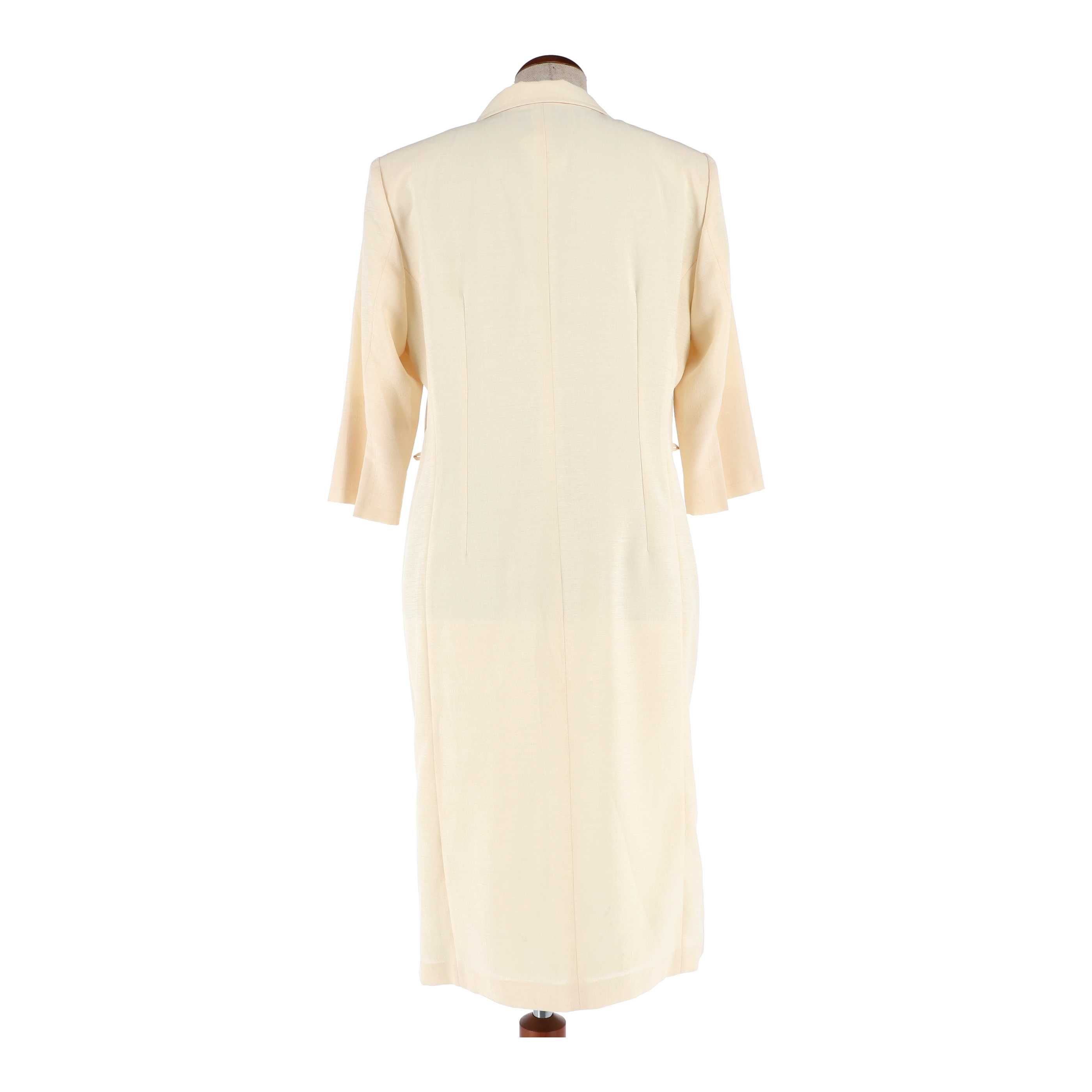 Kremowa sukienka marki Szefler, rozmiar 46