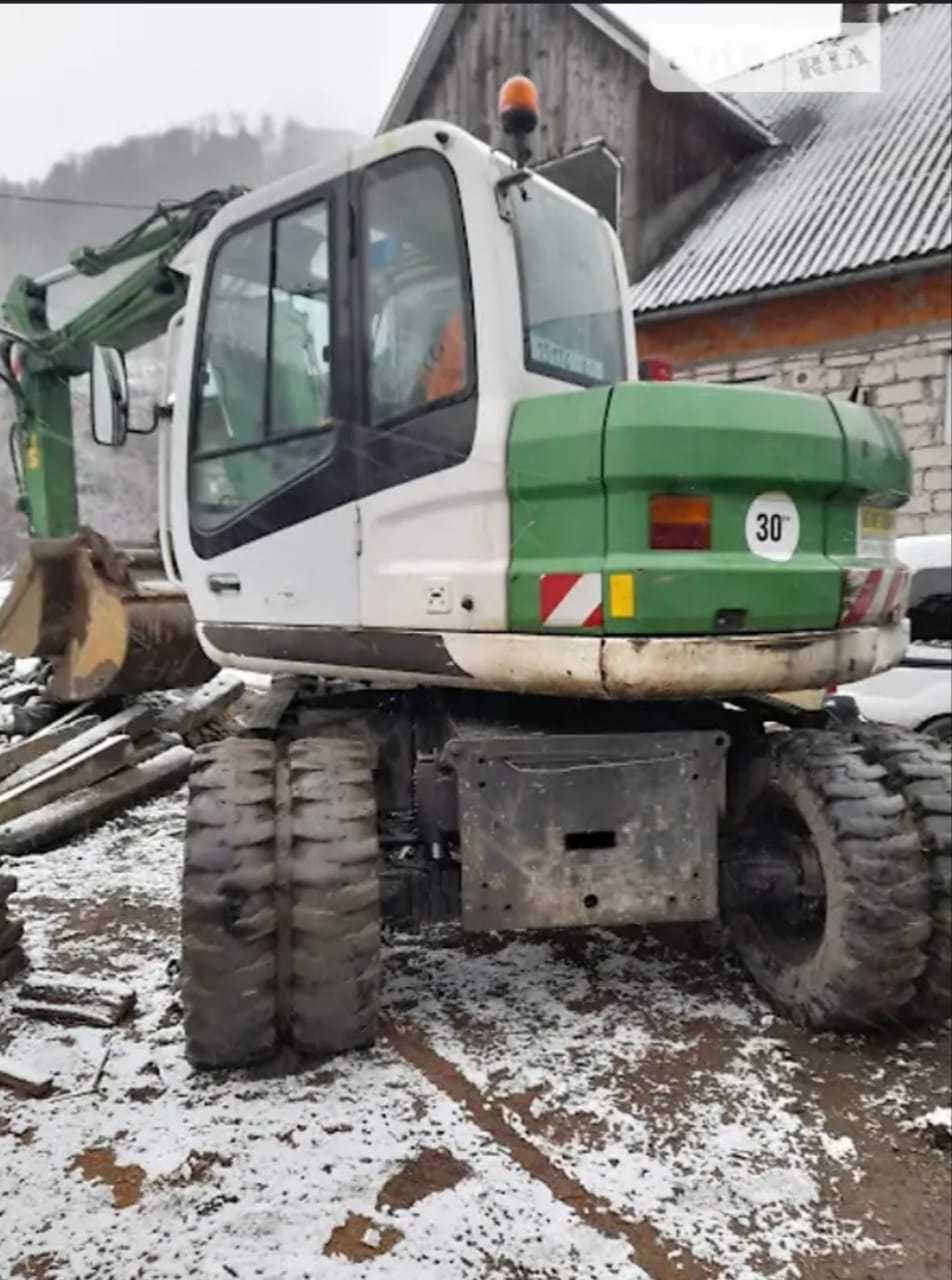 Колісний екскаватор New Holland MH3.6 2008рік CAT JCB Volvo