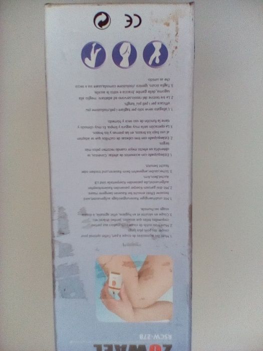 Máquina Depilatória com carregador elétrico.