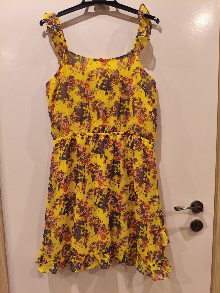Żółta sukienka na ramiączkach z falbanką roz. L-XL