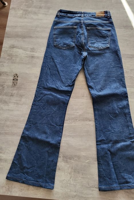 Джинси клёши тёмно - синие