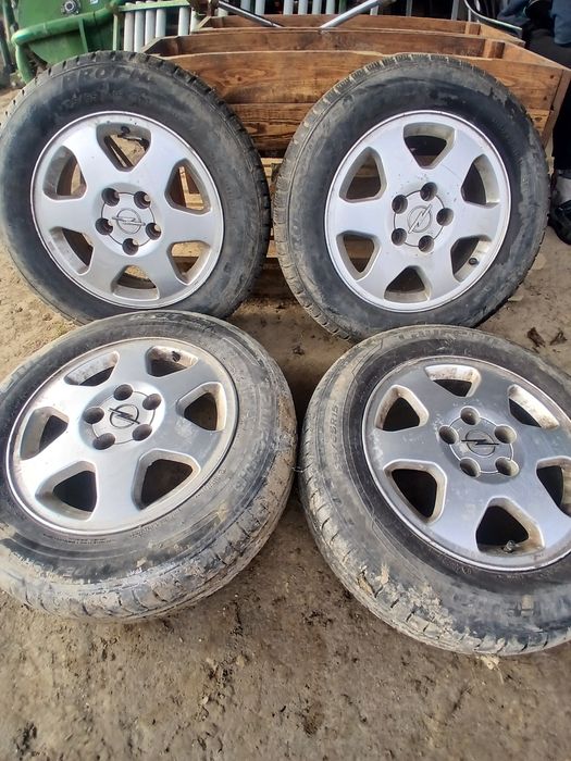 Felgi z oponami Opel