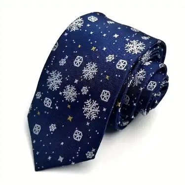 Świąteczny krawat w odcieniu granatu z płatkami śniegu