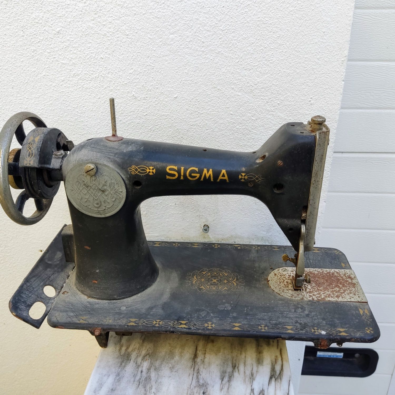 Cabeça de máquina de costura antiga