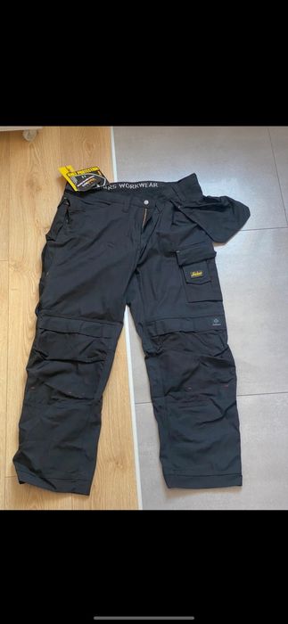 Nowe spodnie robocze Snickers 3214 Canvas +