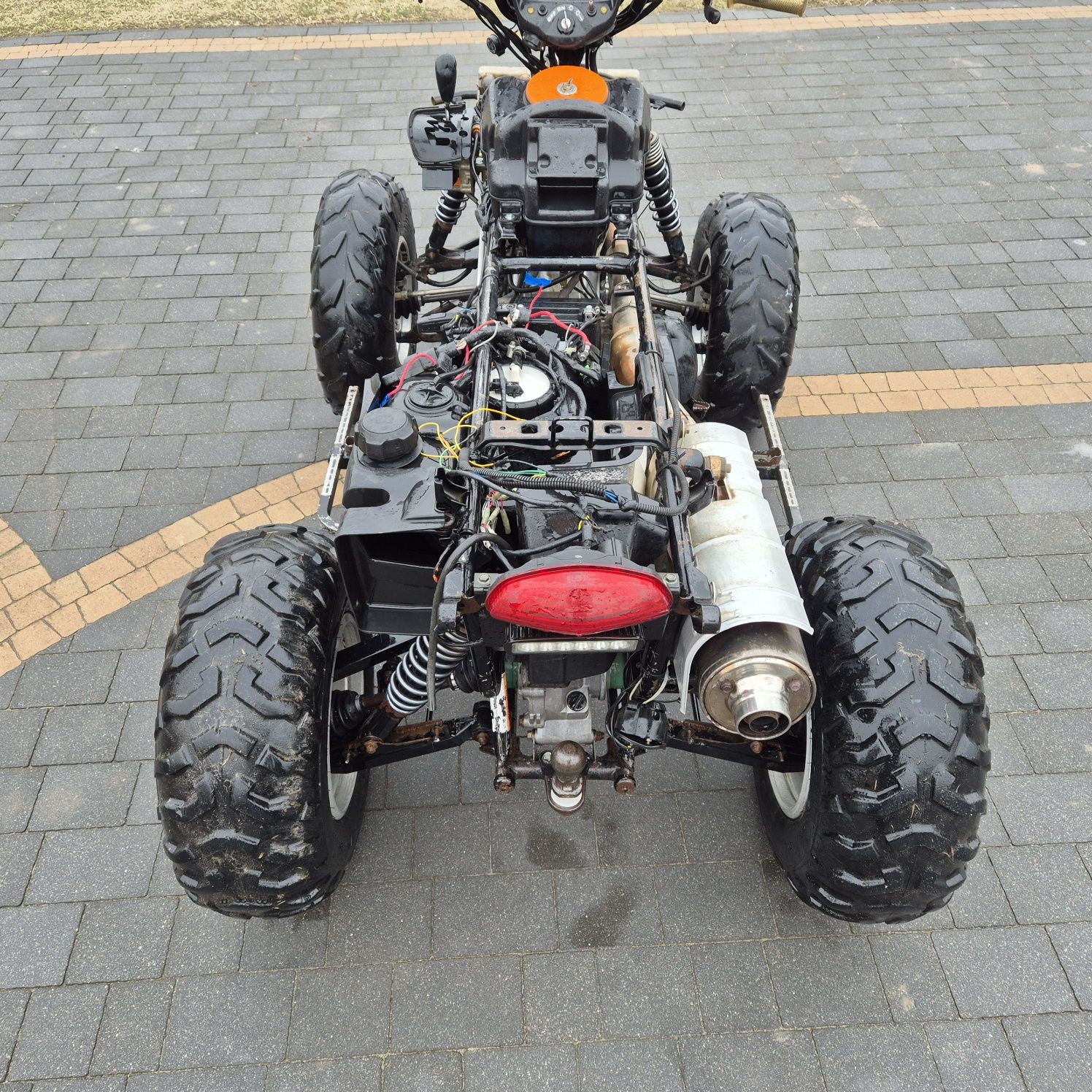 Kingquad LTA 700 silnik plastiki mosty półosie lampy koła