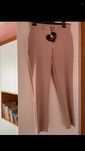 Lalous kremowe eleganckie spodnie 38