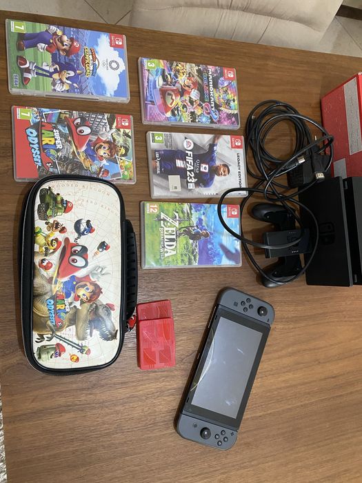 Nitendo Switch em otimo estado com jogos bolsa e acessorios