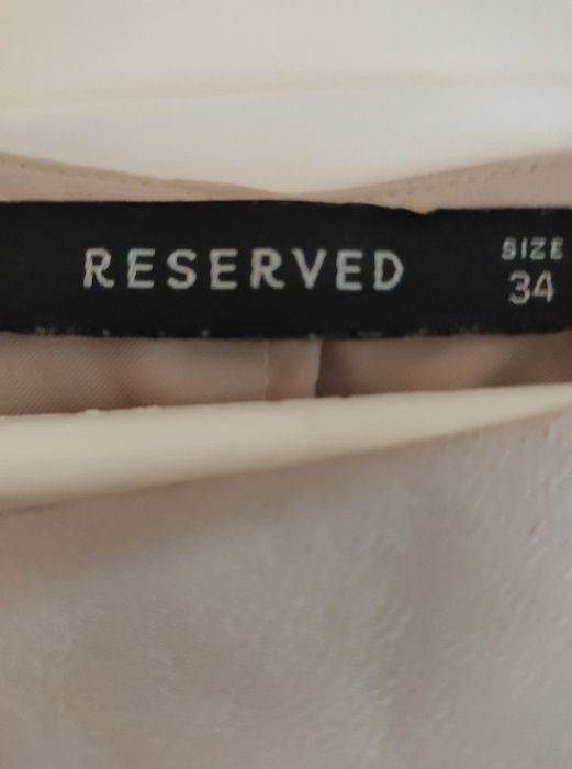 Pudrowa sukienka Reserved rozmiar 34