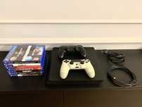 PlayStation 4 Slim 1TB + 2 pady + 7 gier – stan bardzo dobry