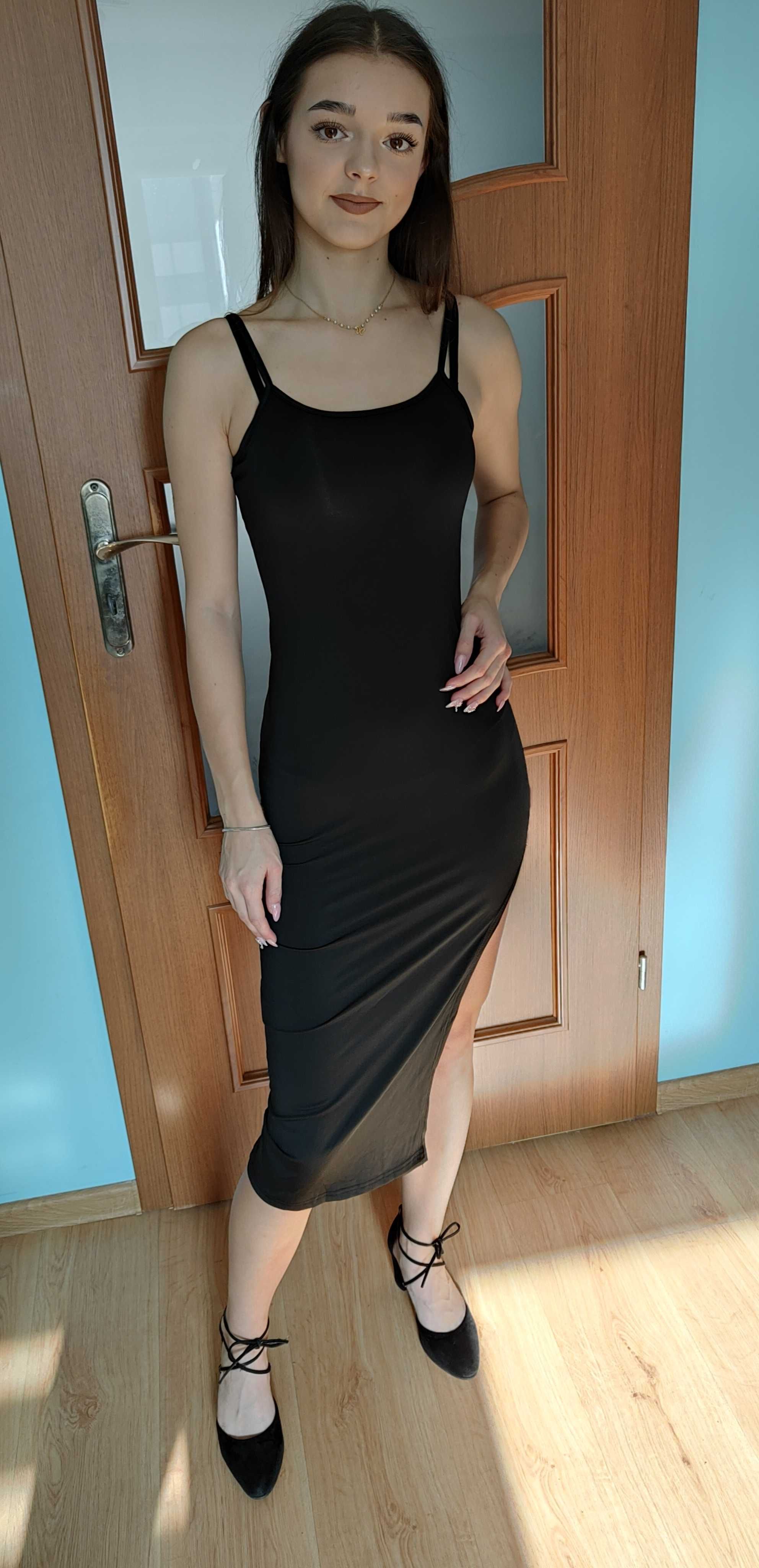 Czarna sukienka z wycięciem seksowna
