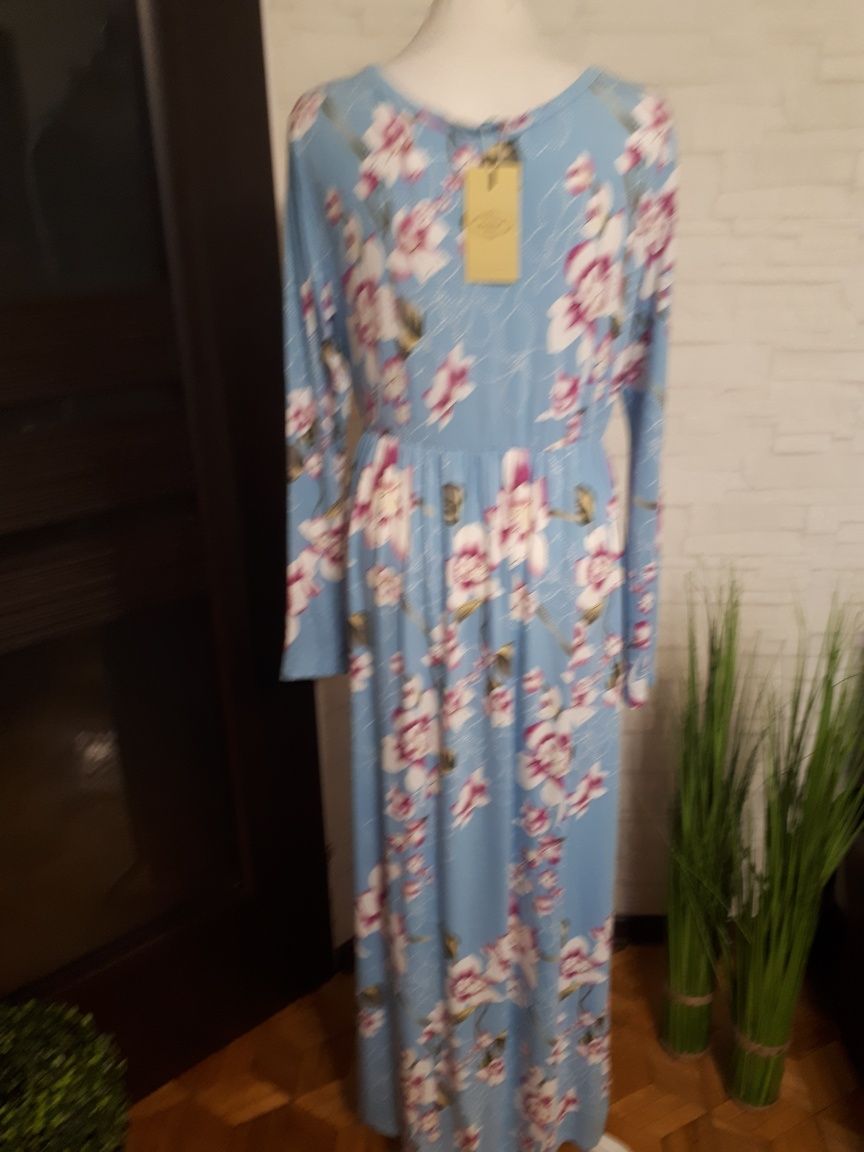 Nowa sukienka w pięknym błękitnym kolorze w kwiaty m-ki Hao Meili, r.4