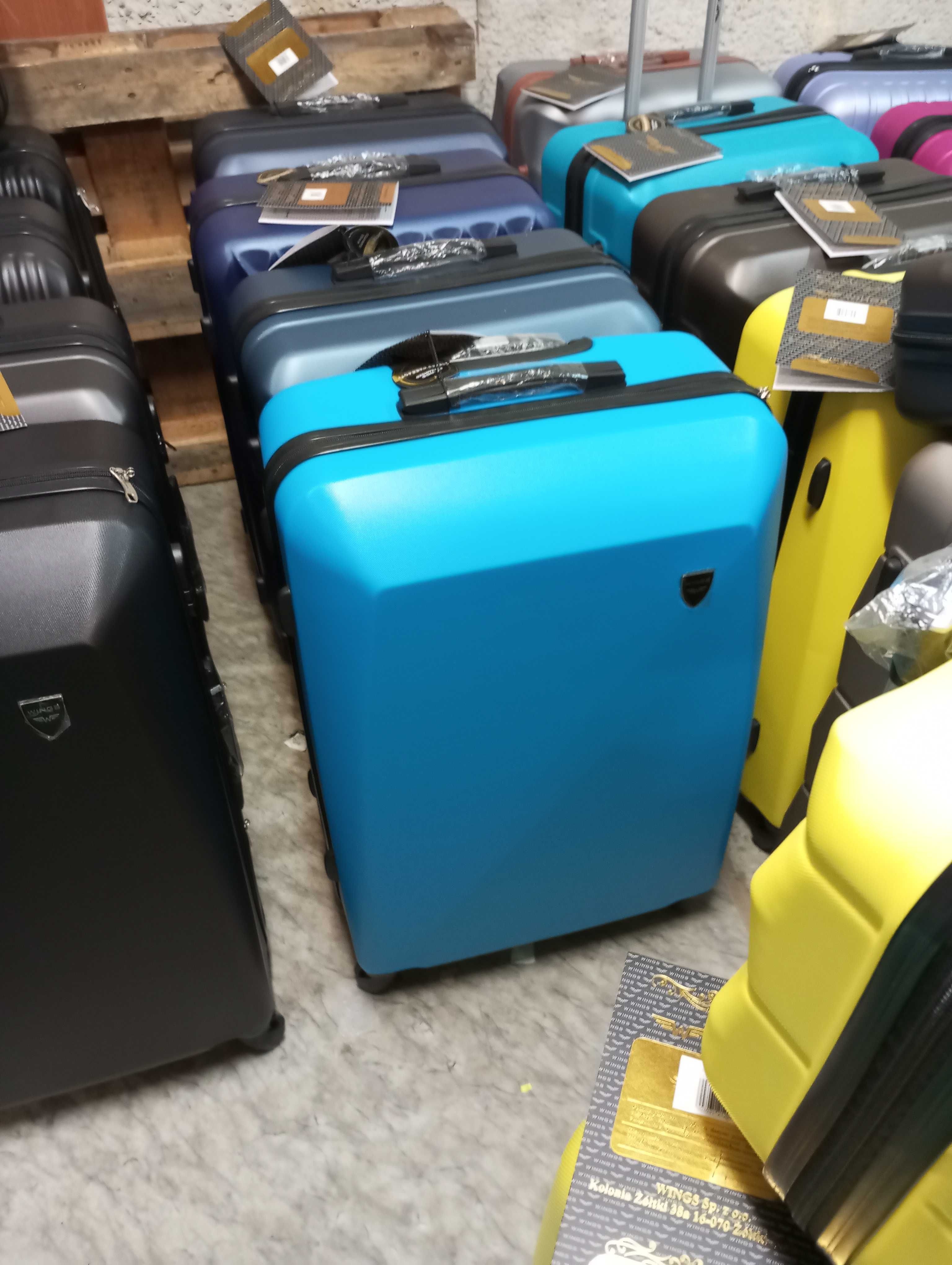 Walizka podróżna średnia Xl z wings na 4 kołach z abs
