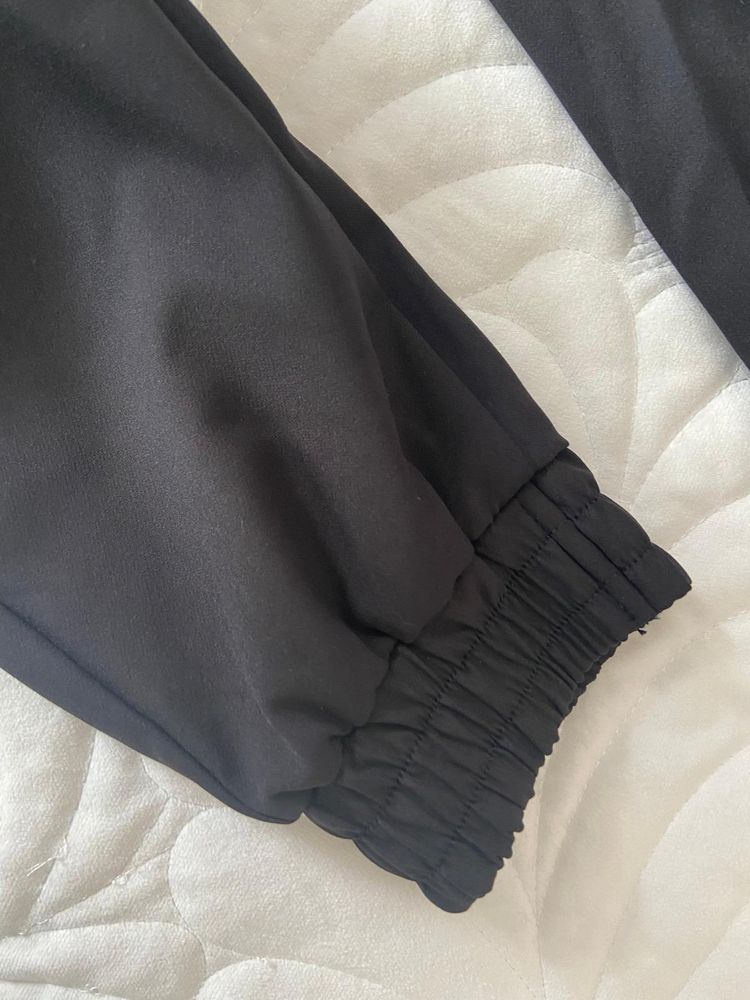 Czarne spodnie ze ściągaczami balenciaga