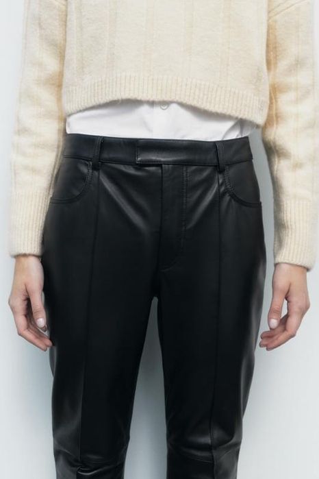 Шкіряні штаны чорного кольору з кишенями