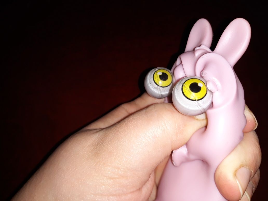 Антистрес собака розовая с глазами резиновый детская игрушка