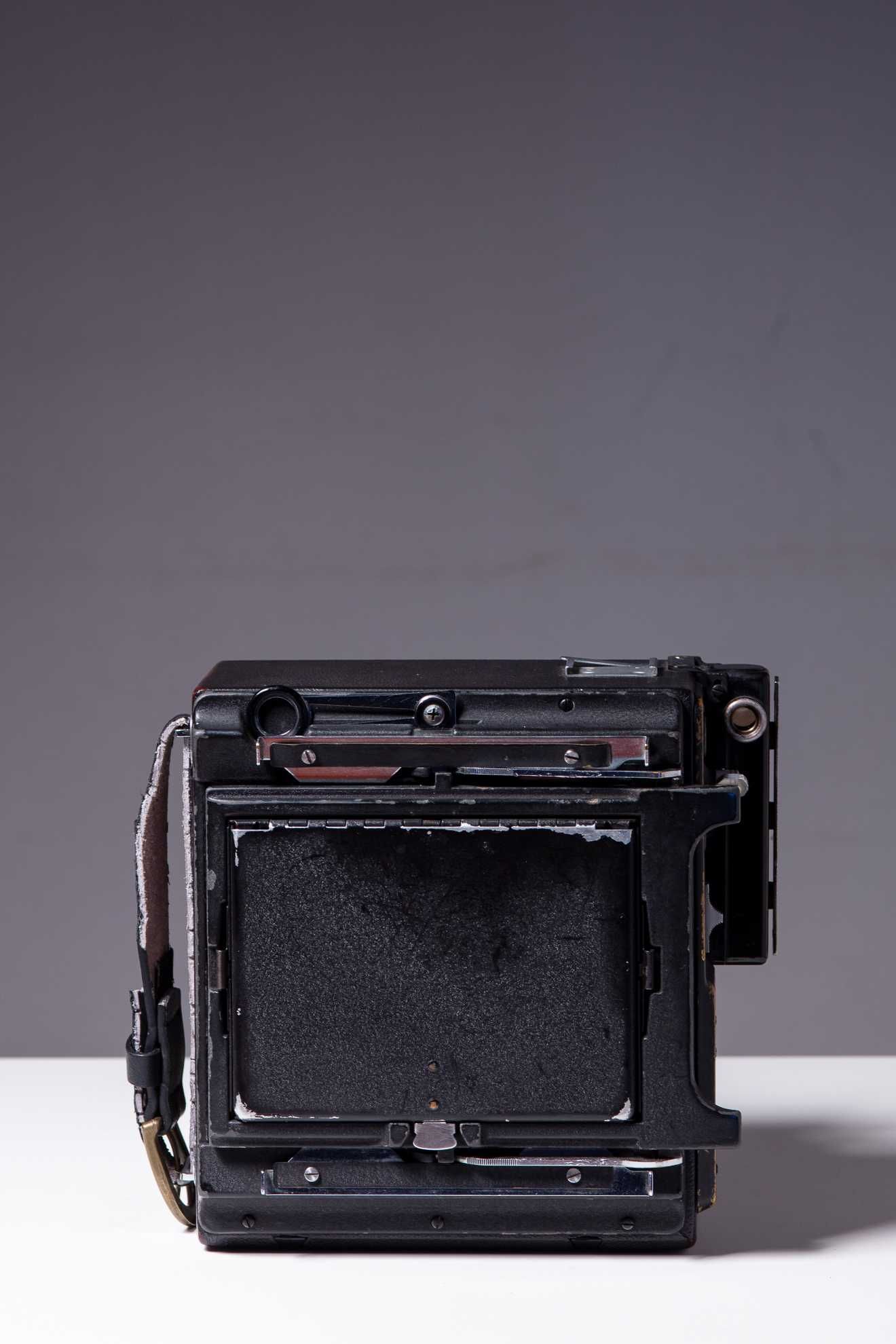 Camara 4 x 5" grande formato Graflex Speed Graphic - Optar 135mm F/4.7