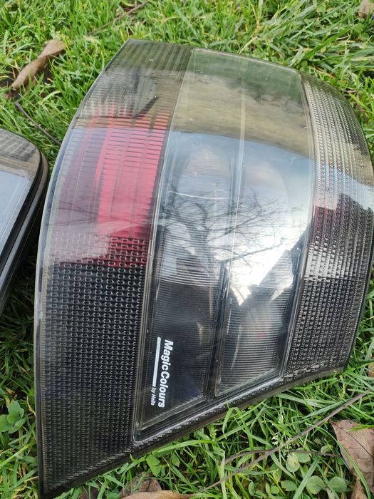 Vw golf IV 4 lampy hella magic colours czarne tylne tylnie prawa lewa