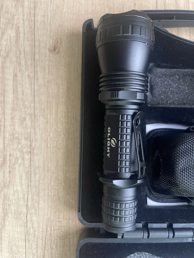 Latarka Olight M21-X Warrior + 2x akumulator 18650 oraz ładowarka