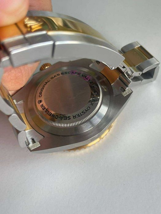 Zegarek Rolex czarno-złoty, stan doskonały