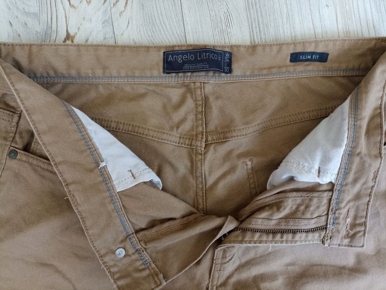 Фірмові штани брюки джинси чоловічі стан нових