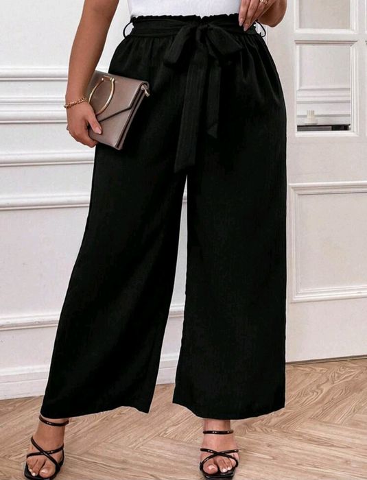 Nowe spodnie materiałowe r. 0XL