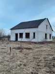 Продаж ділянки з незавершеним будинком в Полянці