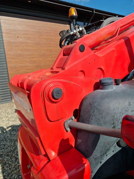 телескопічний навантажувач  MANITAU MT1033