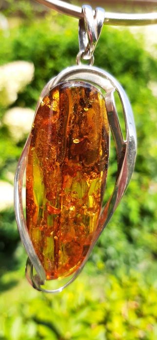 Oryginalny wisior bursztyn w srebrnej oprawie i pierścionek