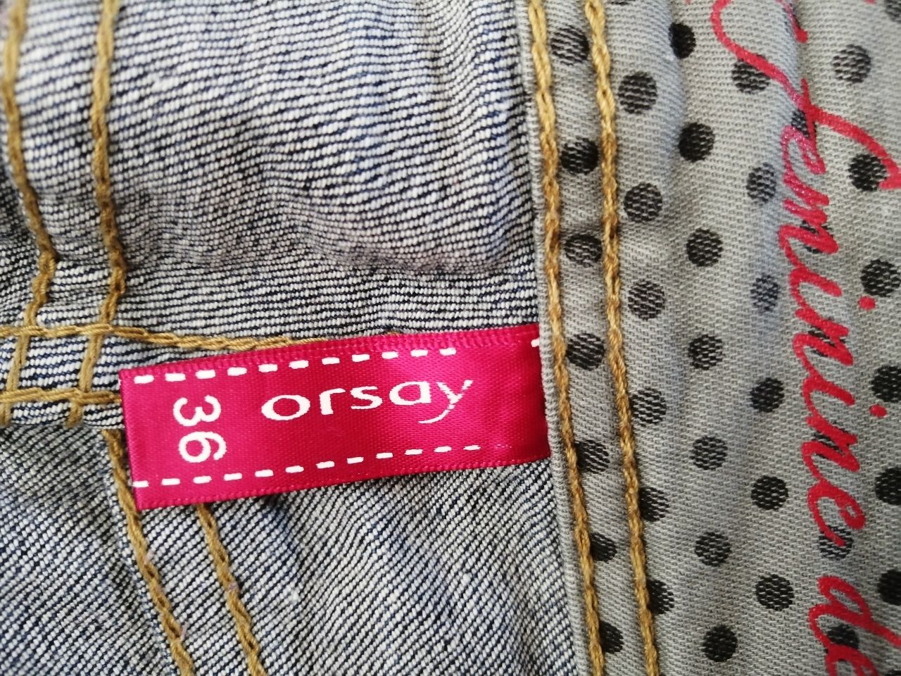 Jeansy biodrówki Orsay 36 S przebarwienia