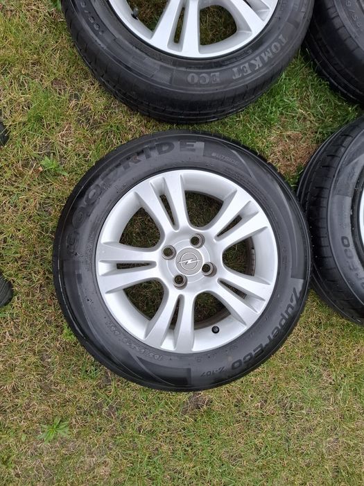 koła alufelgi 15 185/65/R15 OPEL CORSA D E 4x100 9