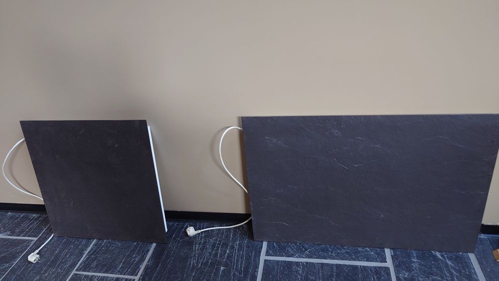 dois radiadores de aquecimento elétrico radiante, em pedra