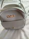 Mochila de cor cinza