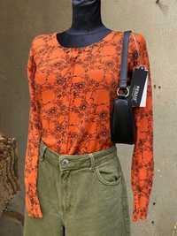 Sweter damski rozpinany na guziki pomarańczowy w kwiaty  38 M