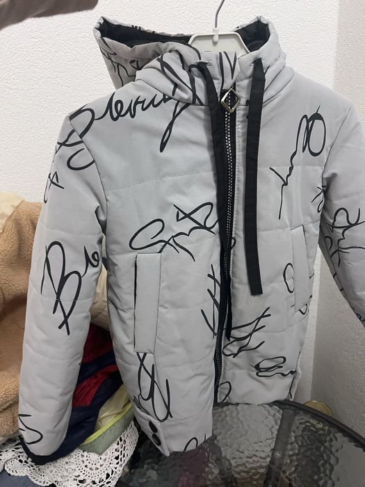 Куртки різні хлопчик - дівчинка