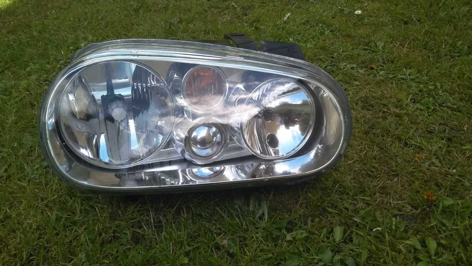 Reflektor; lampa prawa Golf IV; orginał