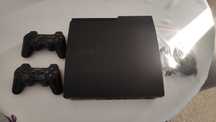 PlayStation 3 slim 320 GB +pady + 4gry