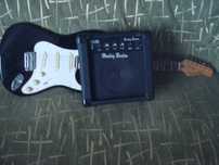 Продам электрогитару Stratocaster с комбиком