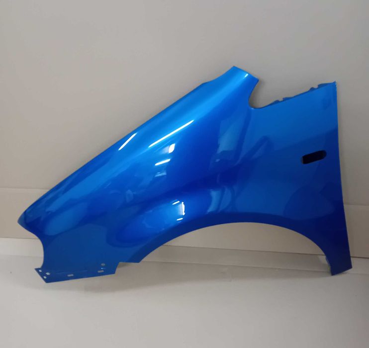 VW Caddy 2K 04 -10 r lewy błotnik niebieski LA5W