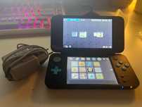 New Nintendo 2DS XL + 4 Gry
