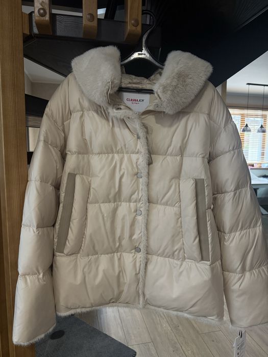 Куртка нова 48р