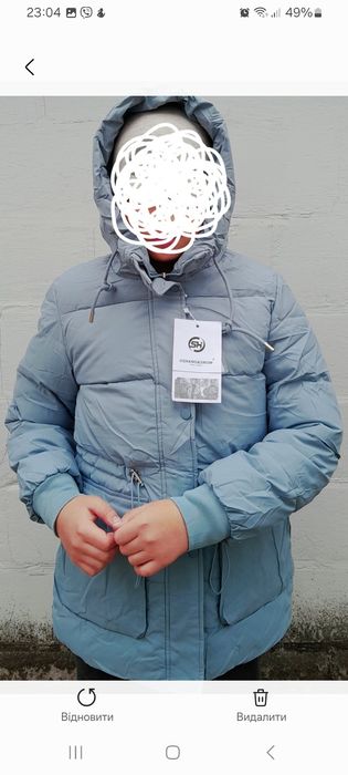 Зимова куртка на дівчинку підлітка